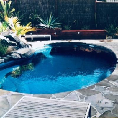 Oval pool with stream